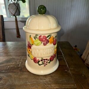 Cream Ceramic Cookie Jar with Fruit Wreath and Green Knob